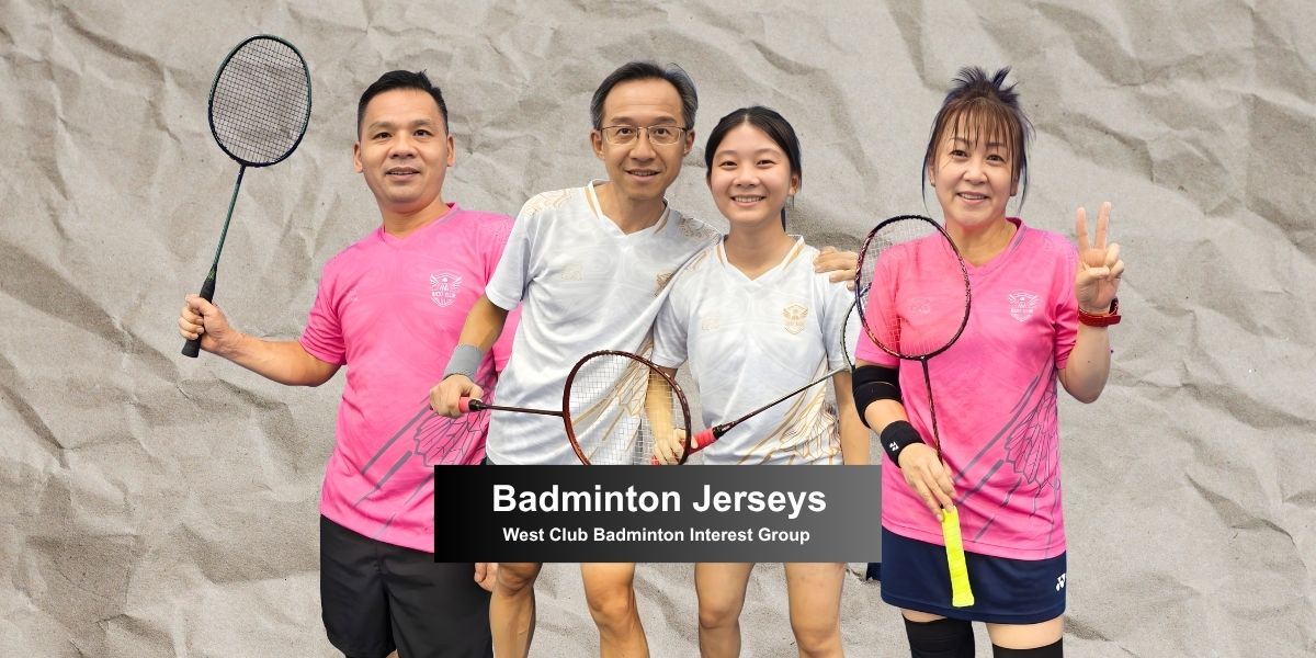 Badminton players from West Club Badminton posing in white and pink custom made jerseys by LEAM.