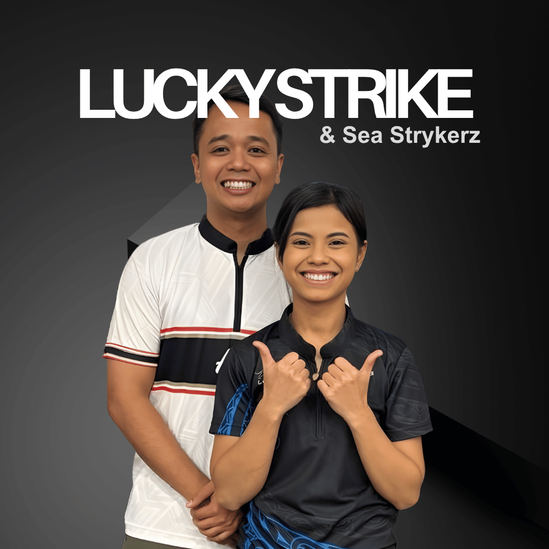 Two smiling bowlers standing together in custom made bowling jerseys, with the text 'LUCKY STRIKE & Sea Strykerz'. 