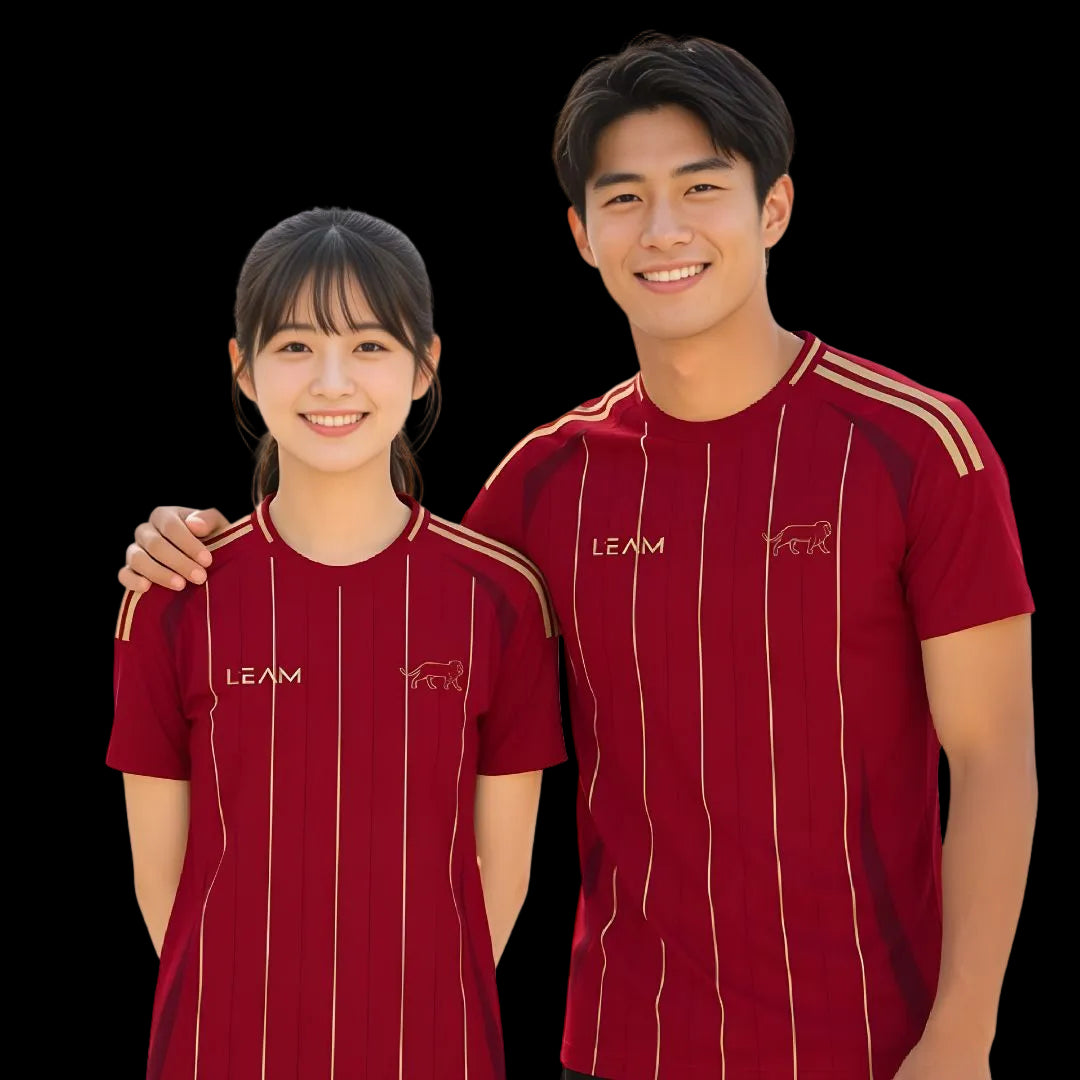 Two models wearing custom maroon jersey with gold stripes