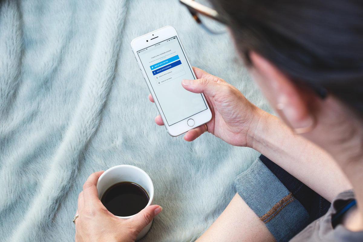 Woman logging on her smart phone